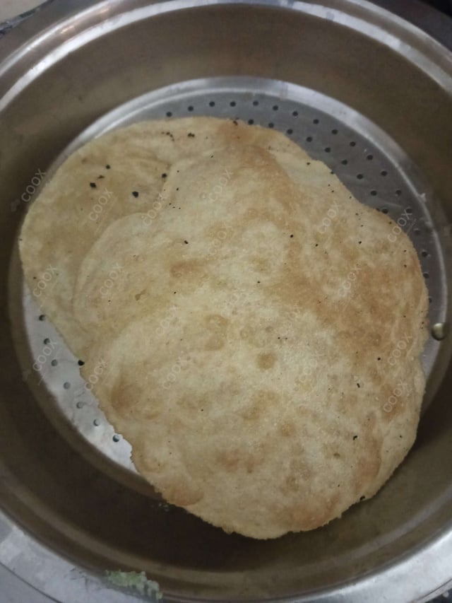 Delicious Bhature prepared by COOX