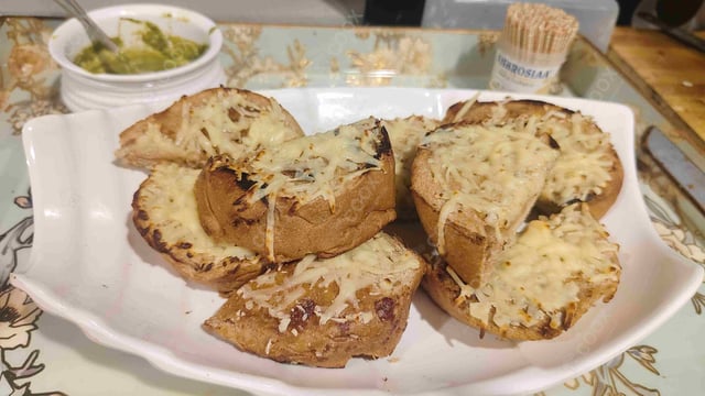 Delicious Garlic Bread with Cheese prepared by COOX