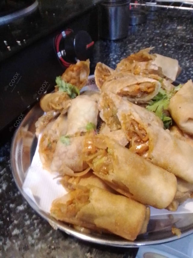 Delicious Veg Spring Rolls prepared by COOX