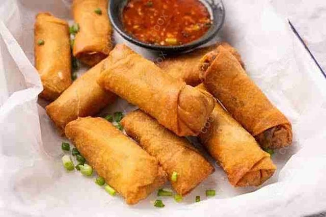 Delicious Veg Spring Rolls prepared by COOX