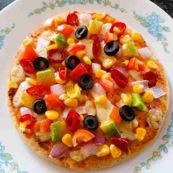 Delicious Veg Pizza prepared by COOX