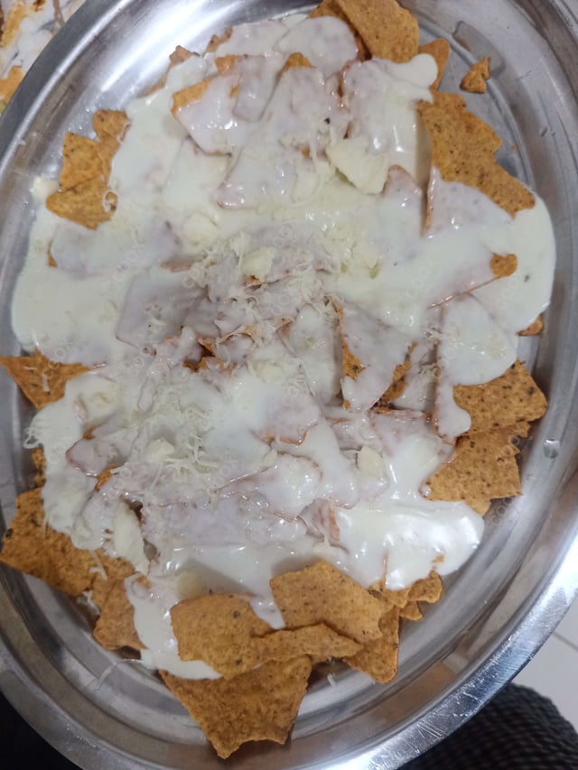 Delicious Cheese Nachos prepared by COOX