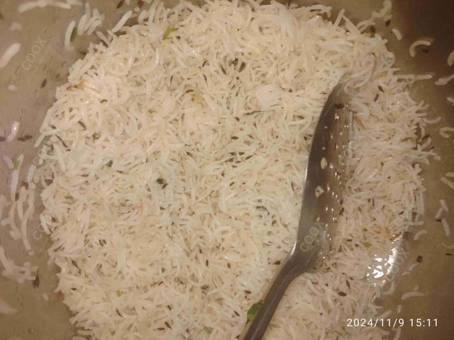 Delicious Jeera Rice prepared by COOX