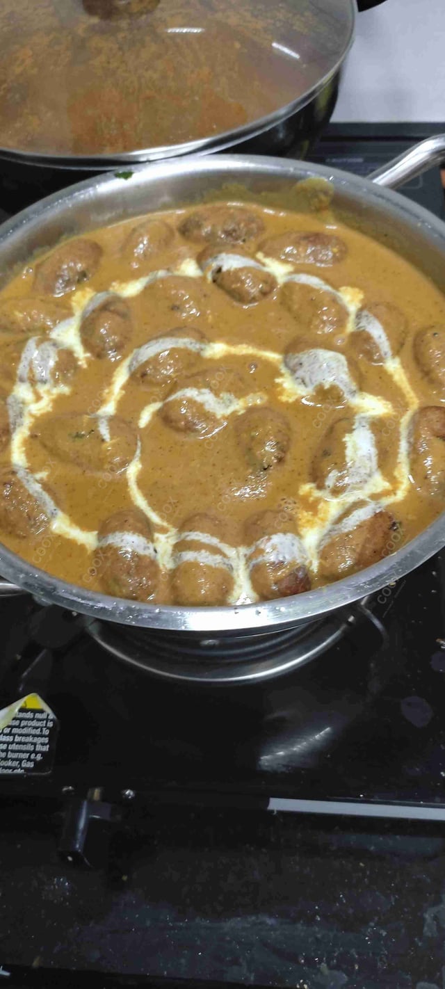 Delicious Malai Kofta (Orange Gravy) prepared by COOX