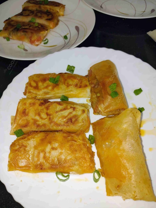 Delicious Veg Spring Rolls prepared by COOX