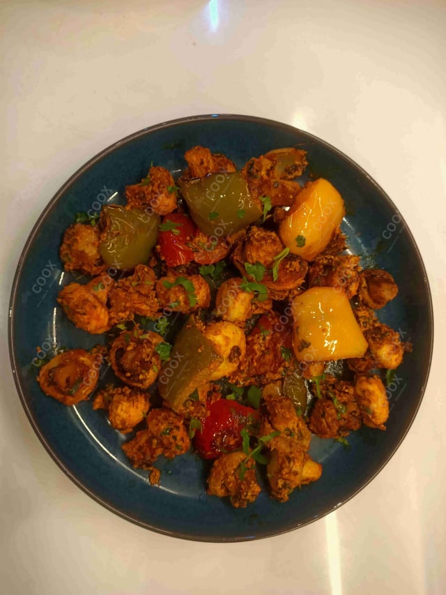 Delicious Mushroom Tikka prepared by COOX