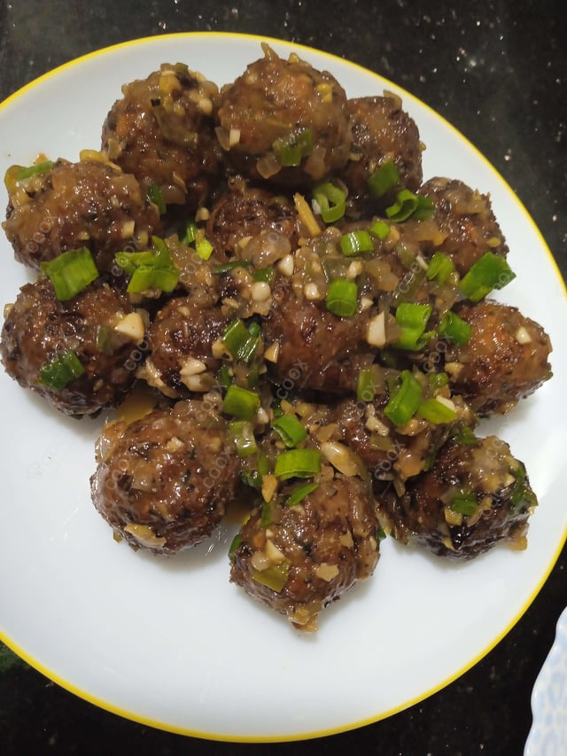 Delicious Veg Manchurian (Dry) prepared by COOX