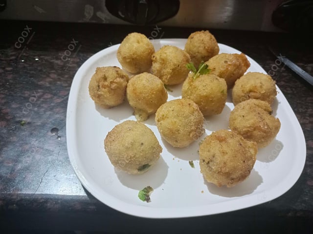 Delicious Fried Cheese Balls prepared by COOX