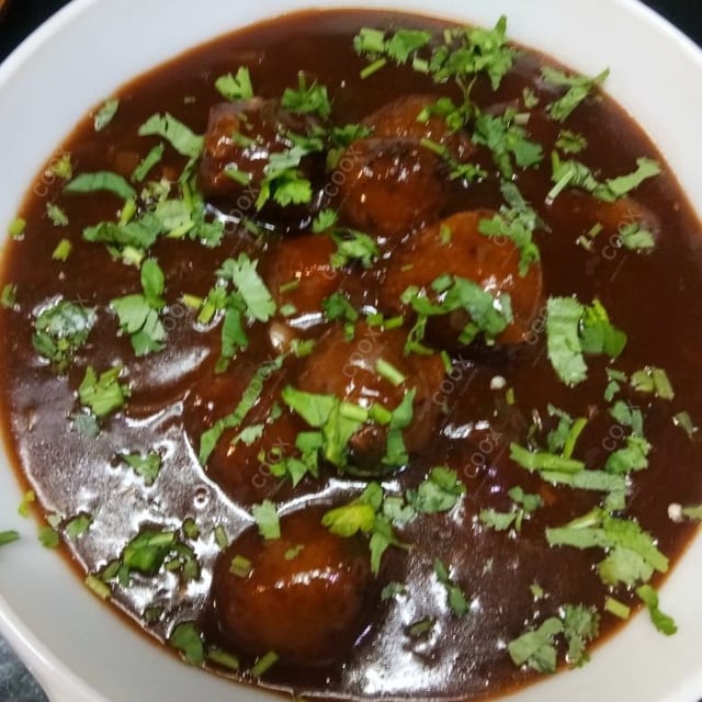 Delicious Veg Manchurian (Gravy) prepared by COOX