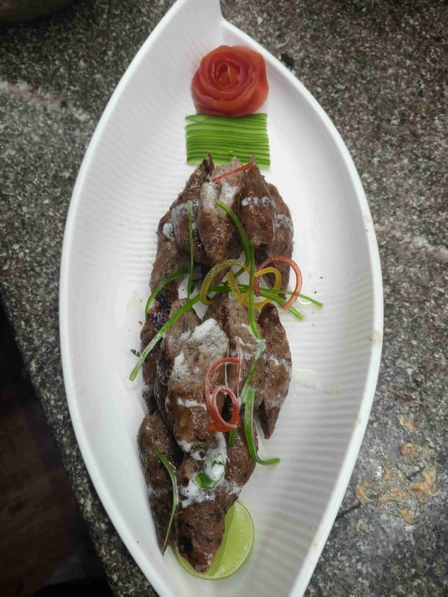 Delicious Chicken Seekh Kebab prepared by COOX