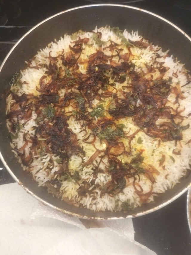 Delicious Mutton Biryani prepared by COOX