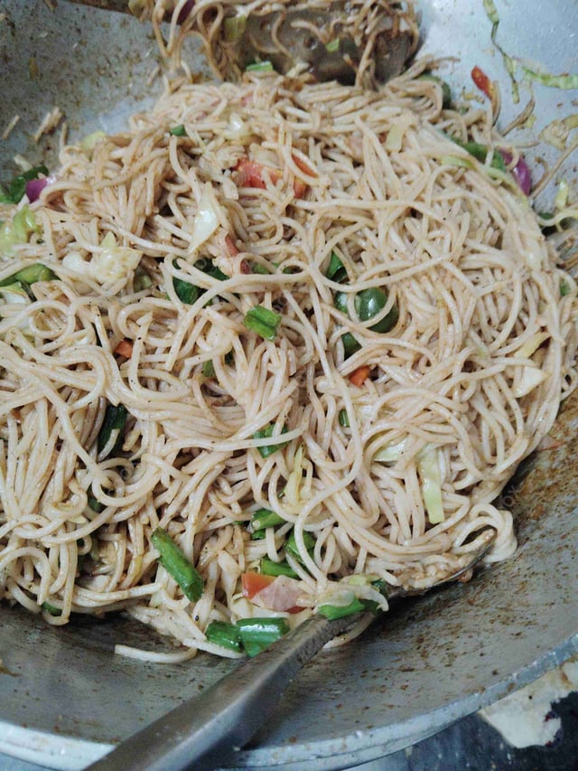 Delicious Veg Hakka Noodles prepared by COOX