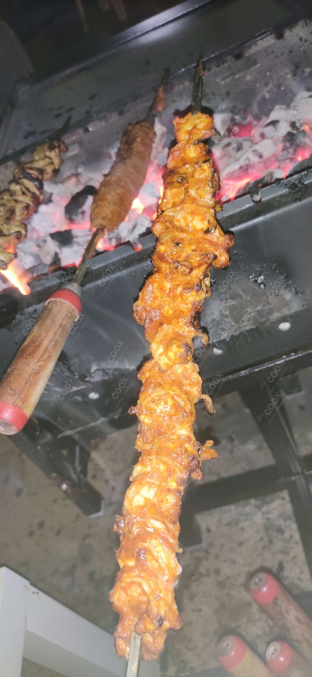 Delicious Mutton Seekh Kebab prepared by COOX