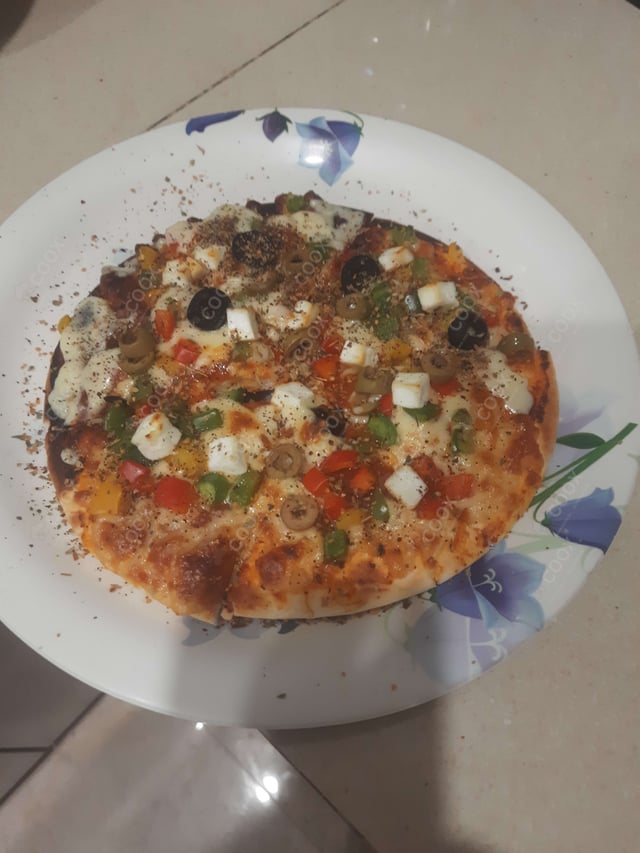 Delicious Veg Pizza prepared by COOX