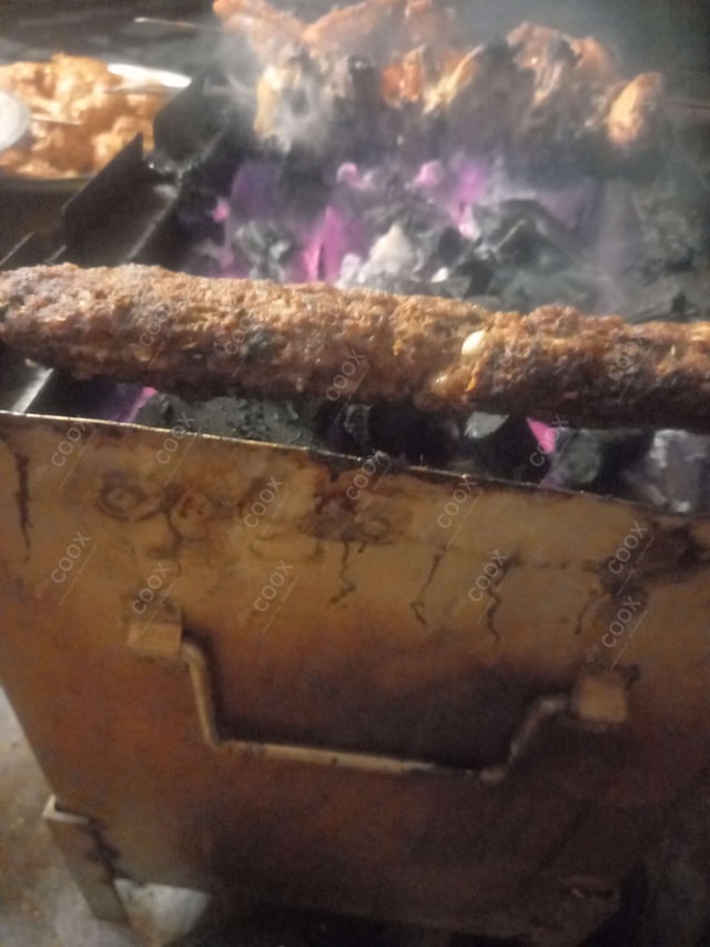 Delicious Mutton Seekh Kebab prepared by COOX