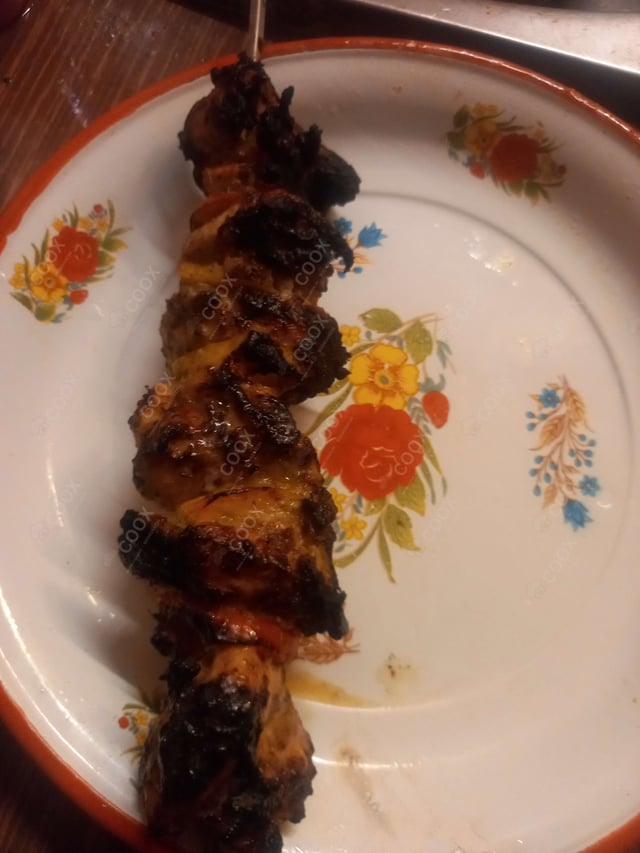 Delicious Murgh Malai Tikka prepared by COOX