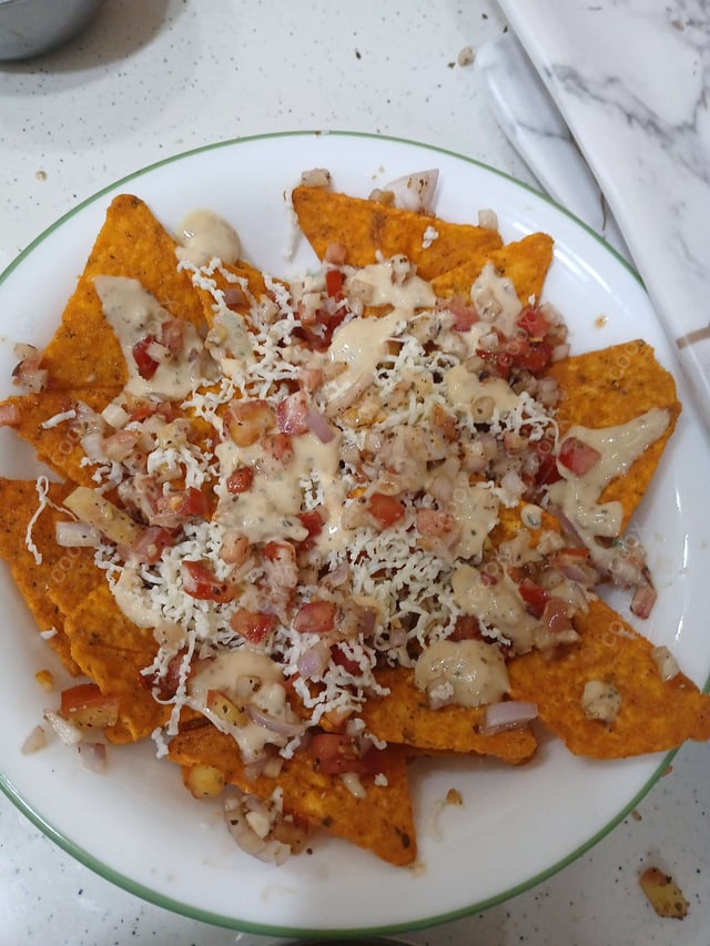 Delicious Cheese Nachos prepared by COOX