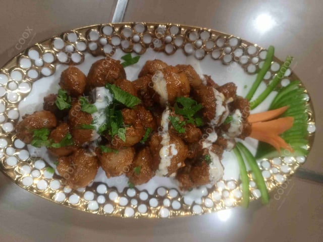 Delicious Mushroom Tikka prepared by COOX