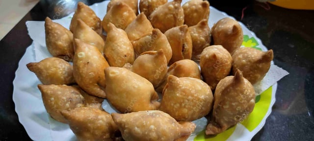 Delicious Mini Samosas prepared by COOX