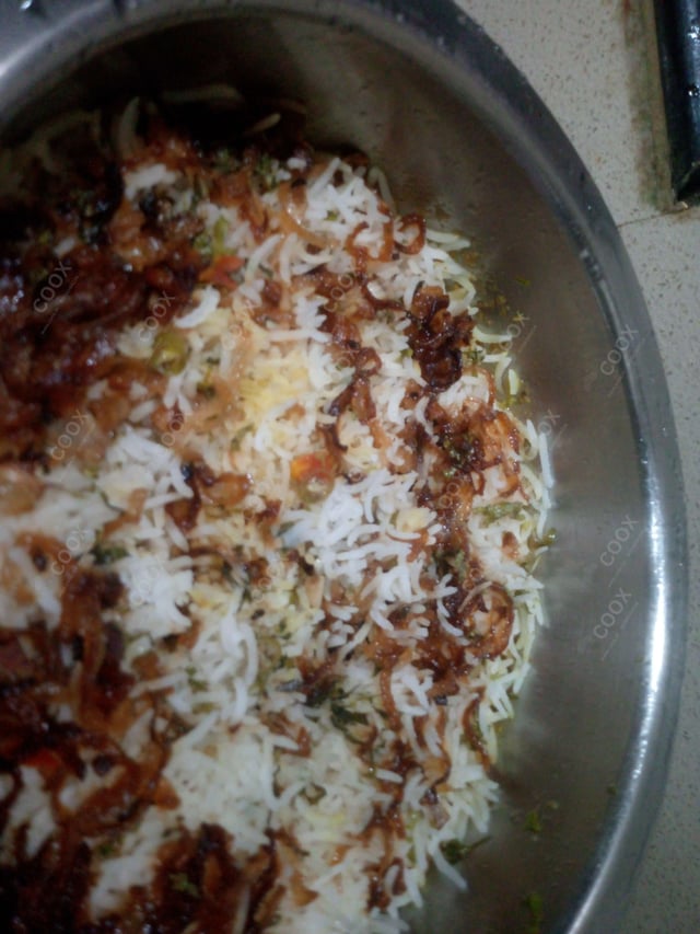 Delicious Veg Biryani prepared by COOX