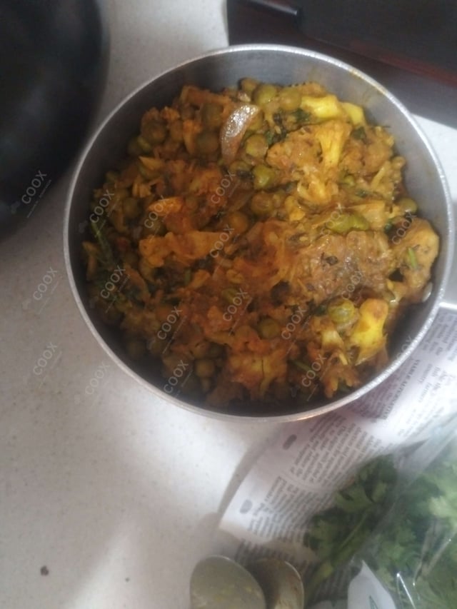 Delicious Gobhi Matar prepared by COOX