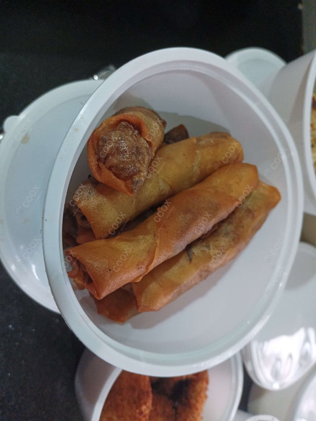 Delicious Veg Spring Rolls prepared by COOX