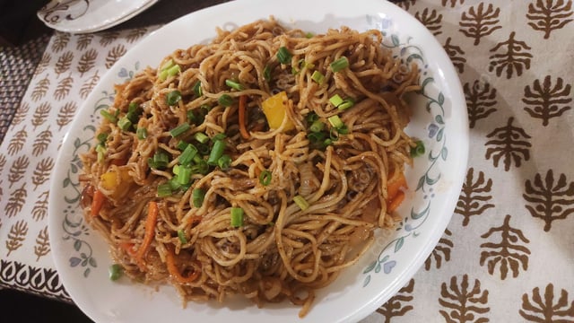 Delicious Veg Hakka Noodles prepared by COOX