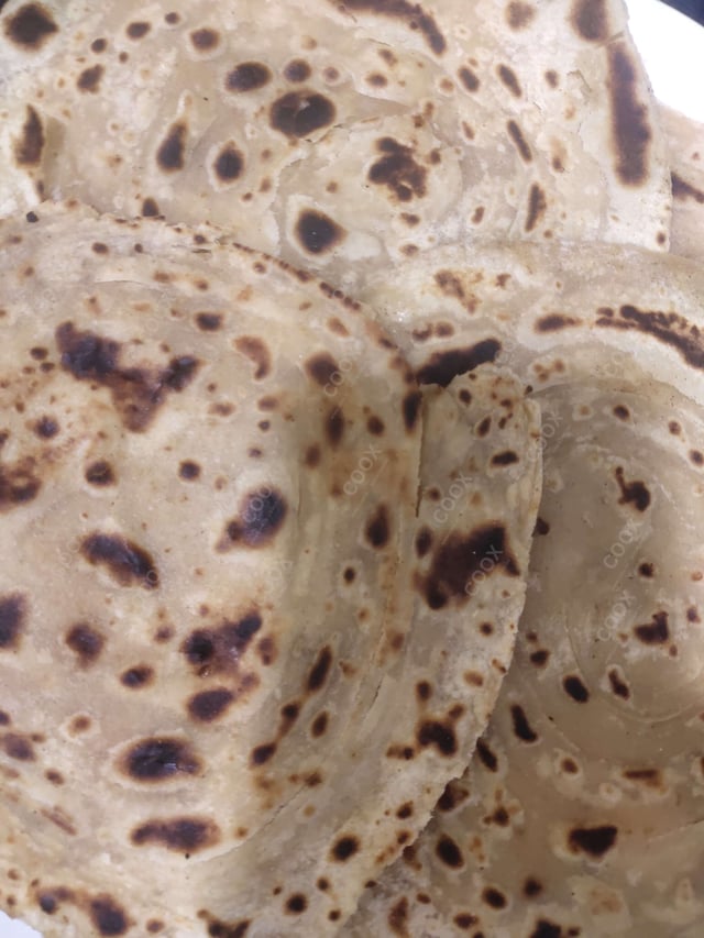 Delicious Lachha Parathas prepared by COOX