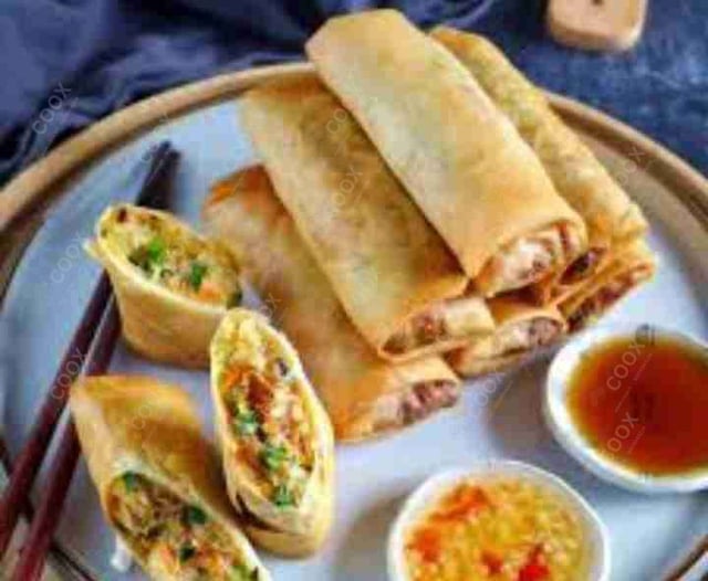 Delicious Veg Spring Rolls prepared by COOX