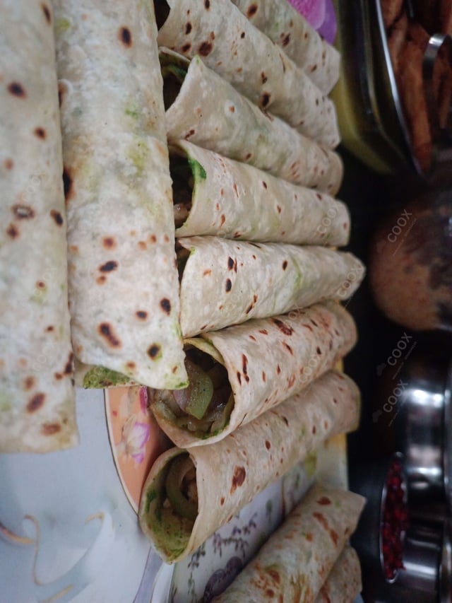 Delicious Veg Kathi Rolls prepared by COOX