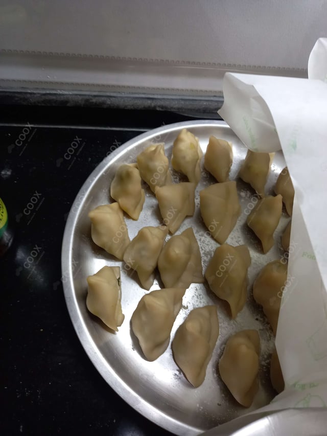 Delicious Mini Samosas prepared by COOX