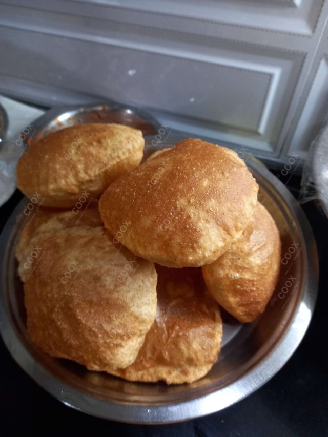 Delicious Bhature prepared by COOX