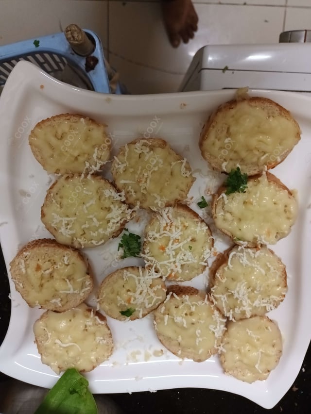 Delicious Garlic Bread with Cheese prepared by COOX