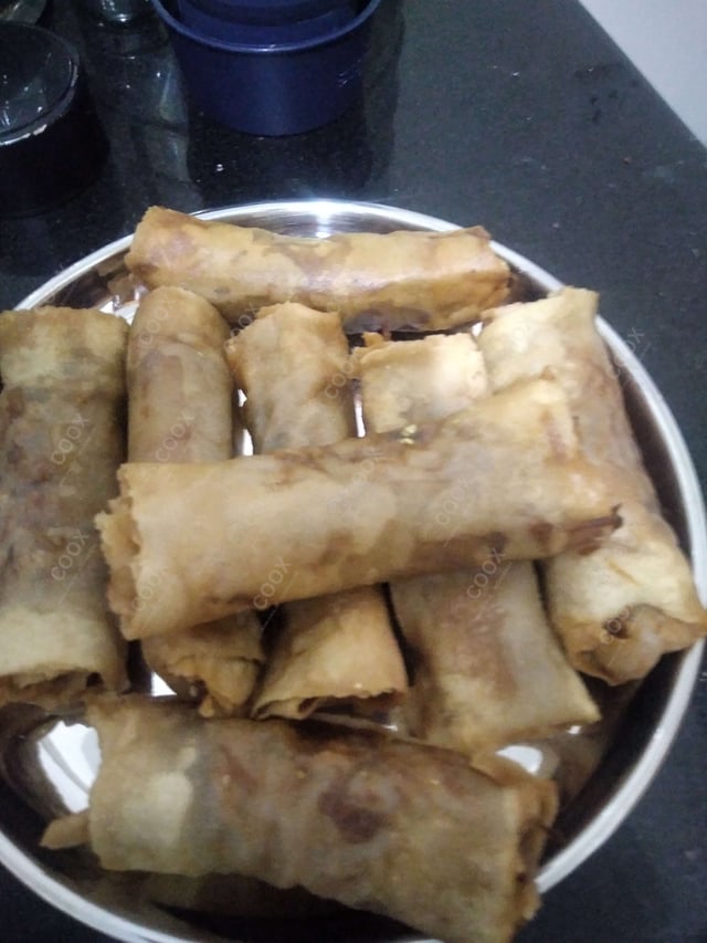 Delicious Chicken Spring Rolls prepared by COOX