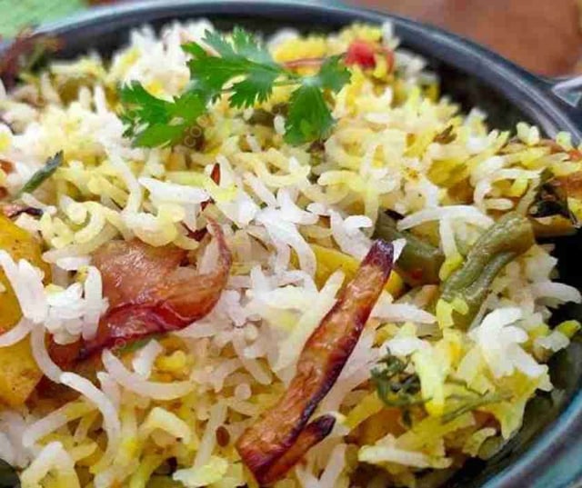 Delicious Veg Biryani prepared by COOX