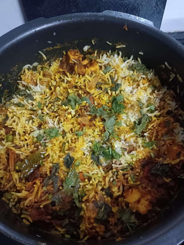 Delicious Veg Biryani prepared by COOX