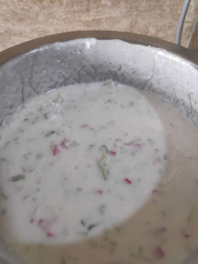 Delicious Mix Veg Raita prepared by COOX