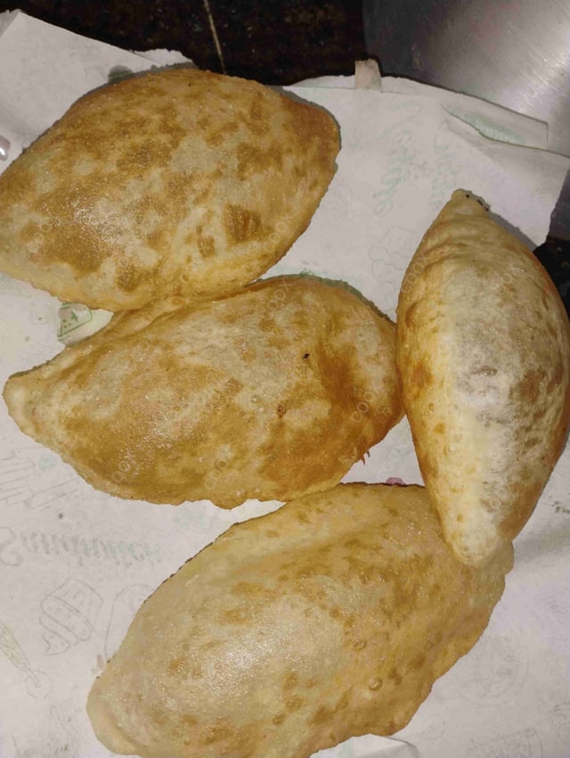 Delicious Bhature prepared by COOX