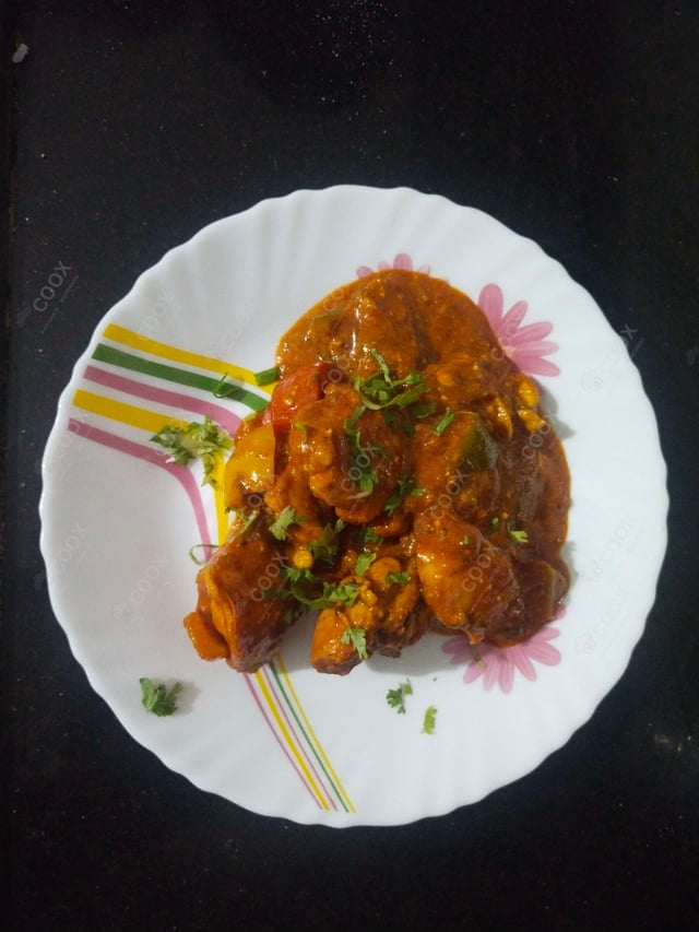 Delicious Kadhai Chicken prepared by COOX