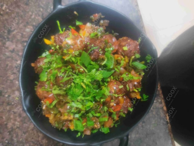 Delicious Veg Manchurian (Dry) prepared by COOX