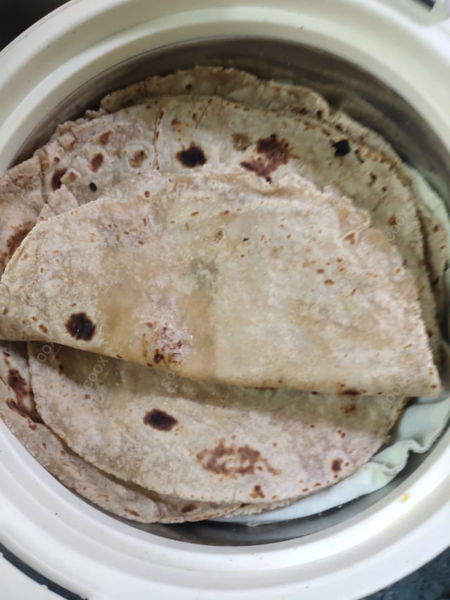 Delicious Tawa Rotis prepared by COOX