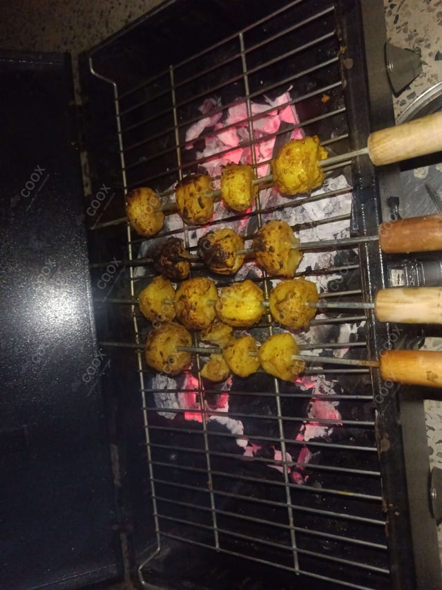 Delicious Tandoori Aloo prepared by COOX