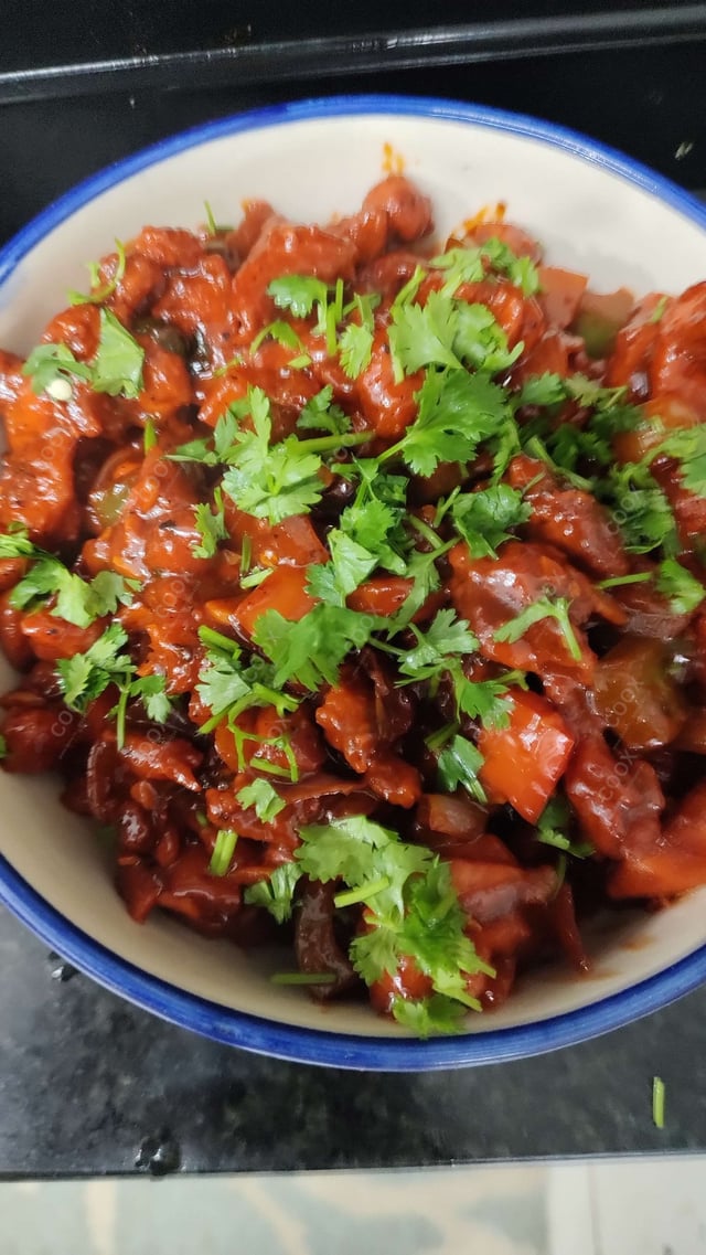 Delicious Chilli Chicken prepared by COOX