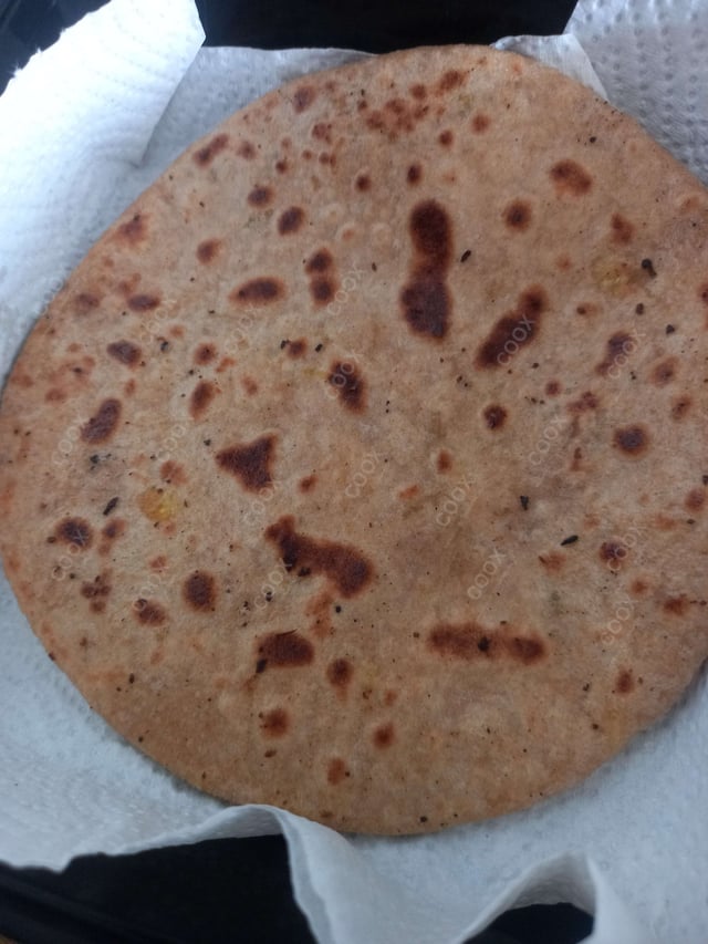 Delicious Stuffed Paranthas prepared by COOX