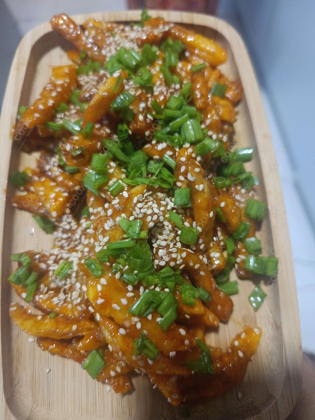 Delicious Honey Chilli Potato prepared by COOX