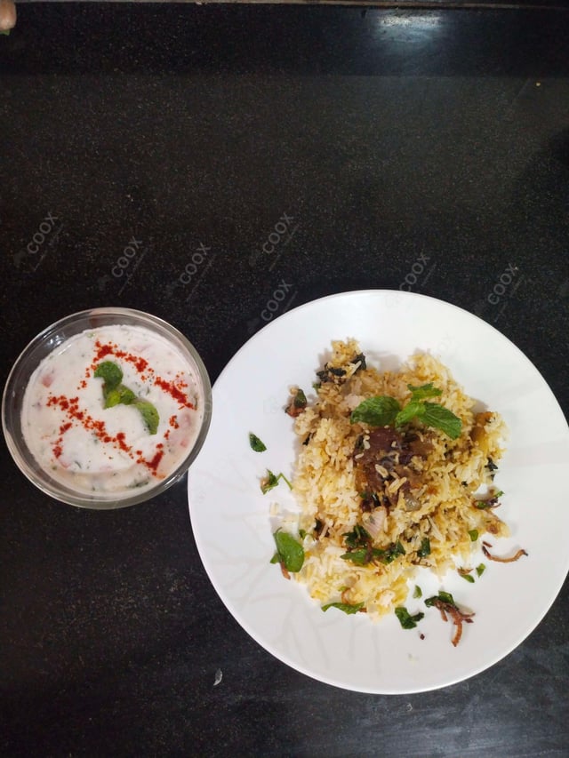 Delicious Mutton Biryani prepared by COOX