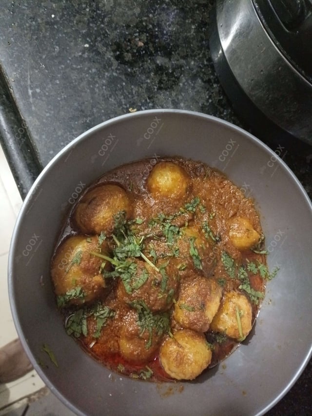 Delicious Dum Aloo prepared by COOX