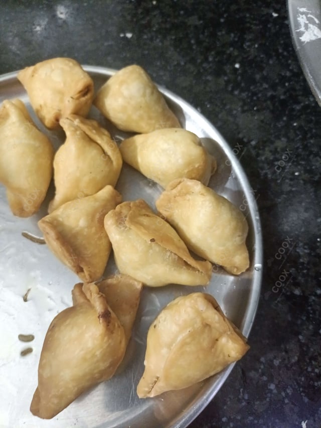 Delicious Mini Samosas prepared by COOX