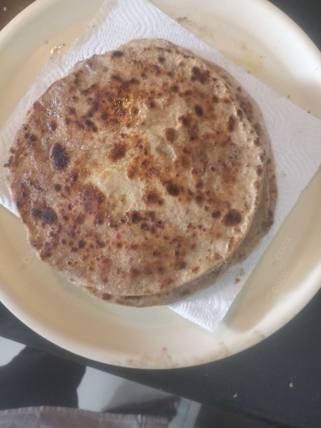 Delicious Stuffed Paranthas prepared by COOX