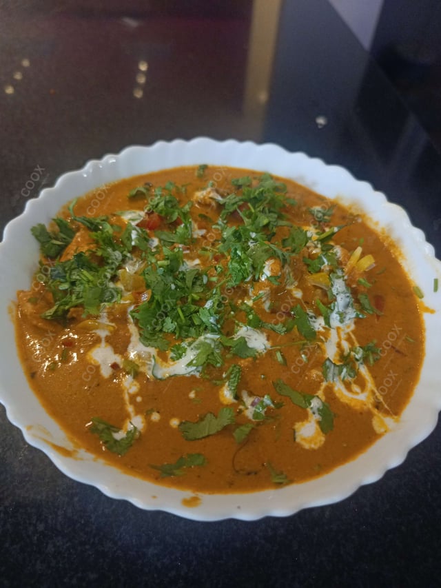 Delicious Chicken Tikka Masala prepared by COOX